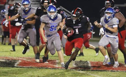 Fort White running back John’l Lawson breaks loose for a touchdown run against Belleview on Friday. (MORGAN MCMULLEN/Lake City Reporter)
