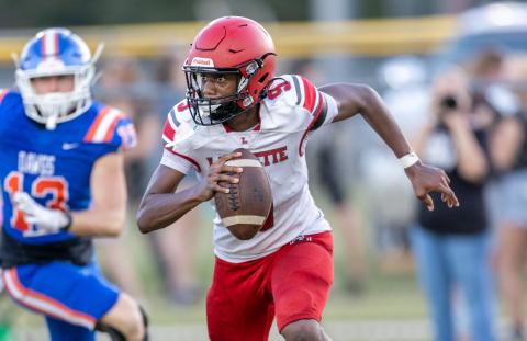 Lafayette quarterback Tywan Williamson scrambles against Taylor County during the Preseason Classic on Aug. 15. (Photos by JACK HOWDESHELL/Lake City Reporter)