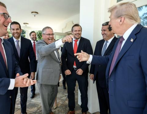 President Donald Trump (right) points at Rep. Chuck Brannan (middle) and thanked him Thursday for sponsoring the bill to name a portion of Southern Boulevard in Palm Beach County after him. Also visiting the West Wing on Thursday from the Florida House of Representatives were Lawrence McClure (from left), House Speaker Daniel Perez, James Buchanan and Tyler Sirois. (COURTESY CHUCK BRANNAN)
