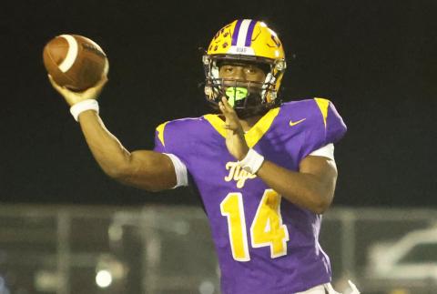Columbia quarterback Xavier Collins throws a pass against Trinity Christian last Friday. (PAUL BUCHANAN/Lake City Reporter)