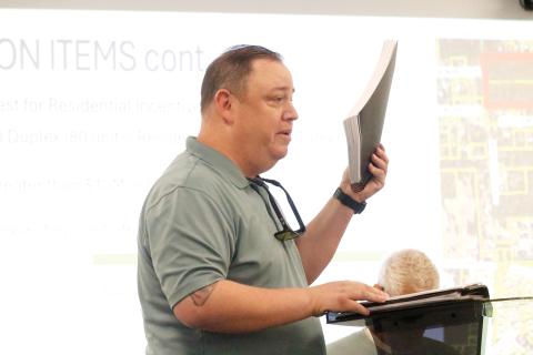 Dylan Adams with the Haymar Group talks about the 80-door duplex project on Turner Avenue with the Columbia County Economic Development Advisory Board on Thursday. (JAMIE WACHTER/Lake City Reporter)