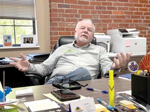 Suwannee County Administrator Greg Scott talks in his office in downtown Live Oak on Sept. 11. Scott is retiring Friday after nearly 37 years of service to Suwannee County as both parks director and county administrator. (JAMIE WACHTER/Lake City Reporter)