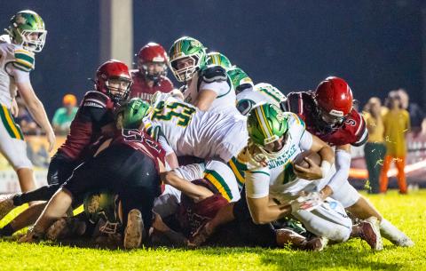 Suwannee quarterback Thomas Sikes scores on a 1-yard touchdown run against Lafayette last Friday. (JACK HOWDESHELL/Lake City Reporter)
