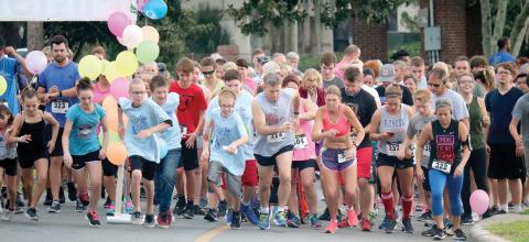 Participants sprint off the starting line at a previous year’s Pregnancy Care Center 5K Walk/Run 4 Life event in Lake City. (FILE)