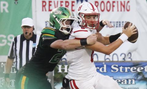 Suwannee defensive end Hunter Watson sacks Hamilton County quarterback Haigen Johnson on Friday. (JAMIE WACHTER/Lake City Reporter)