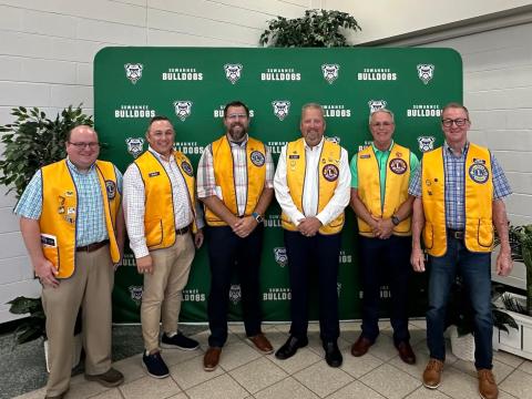 Live Oak Lions Club members Stevie Harris (from left), John  Curls, Adam Hitt, Coy Howell, David Jordan and Chris Fry are pictured at an event at Suwannee High School. The Lions Club has a LEO Club established at SHS. (COURTESY)