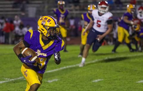 Columbia receiver Brandon Lovett runs after a catch against Manatee last Friday. (BRENT KUYKENDALL/Lake City Reporter)