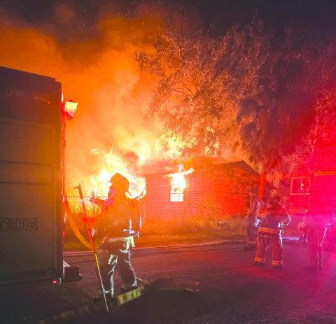 Live Oak Fire Department and Suwannee County Fire Rescue crews battled a blaze at an abandoned house at the Hreen Avenue and Howart Street intersection Oct. 16. (COURTESY LIVE OAK FIRE DEPARTMENT)