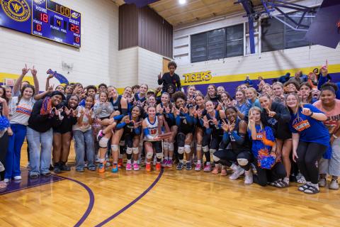 Branford's volleyball team celebrates with fans after defeating Union County to win the District 6-R title on Thursday. (JACK HOWDESHELL/Lake City Reporter)