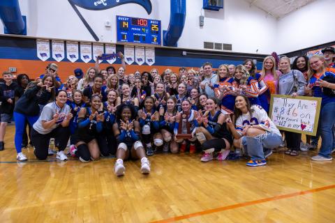Branford's volleyball team celebrates with fans after defeating Union County to win a third straight Region 3-R title on Tuesday. (JACK HOWDESHELL/Lake City Reporter)