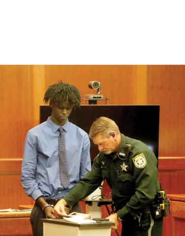 Jayden Burch was fingerprinted after being convicted for second degree murder last month. He was sentenced to life in prison on Monday. (FILE)