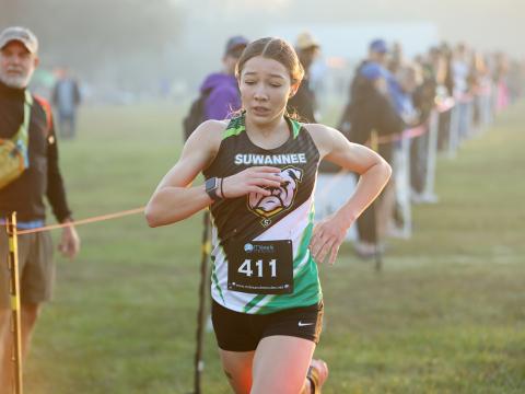 Suwannee's Olivia Hermanson runs at the Suwannee Invitational on Oct. 18. (PAUL BUCHANAN/Lake City Reporter)