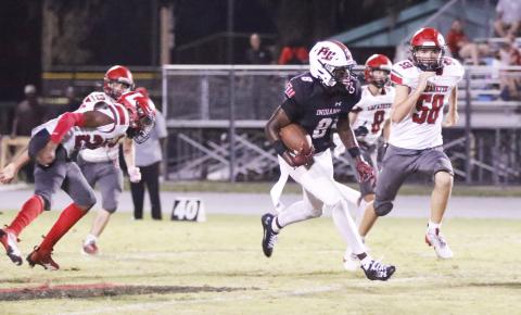 Fort White receiver Jayden Jackson returns a punt for a touchdown against Lafayette last season. (FILE)