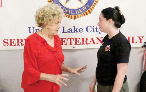 TONY BRITT/Lake City Reporter Patricia Proctor with the American Legion Post 57 (left) and Katelyn Holley with South East Elite Working Dogs talk Wednesday about the Legionnaire Dogs program that is being launched by the Legion with help from Holley and the Lake City Humane Society. The program will help get local veterans with companion or service dogs at no cost. (TONY BRITT/Lake City Reporter)