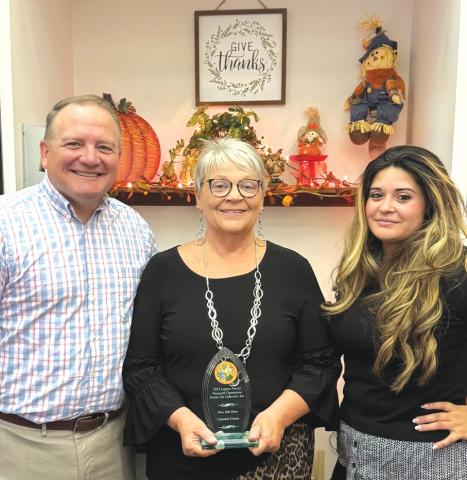 Columbia County Tax Collector Kyle Keen (from left), Finance Director La Gina Dow and Finance Clerk Serena Kirby accepted the Legacy Finance Award during the Florida Tax Collector’s Association’s Fall Education Conference. (COURTESY)