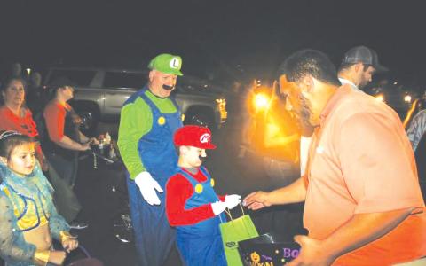 Robert Stalvey and Hagan Stalvey, then 7, dressed up as Mario and Luigi during the 2019 Trunk or Treat event. (FILE)