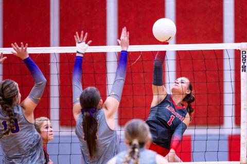 Lafayette hitter Brooke Lamb fires a shot against Columbia on Sept. 29. (JACK HOWDESHELL/Lake City Reporter)