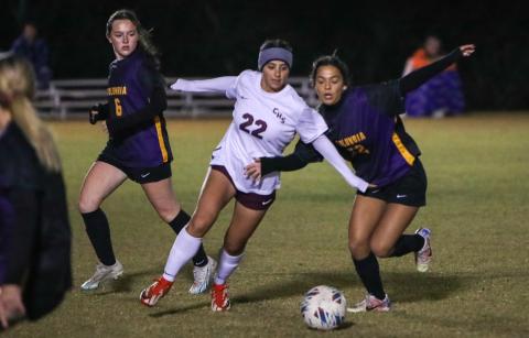 Chiles' Hailey LaMothe fends off Columbia's AJ Stanley on Tuesday night. (BRENT KUYKENDALL/Lake City Reporter)