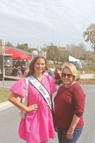 Miss Olustee Layla Merola smiles with Patti Aldous of the Miss Olustee pageant during the opening of this year’s Olustee Festival. (FILE)