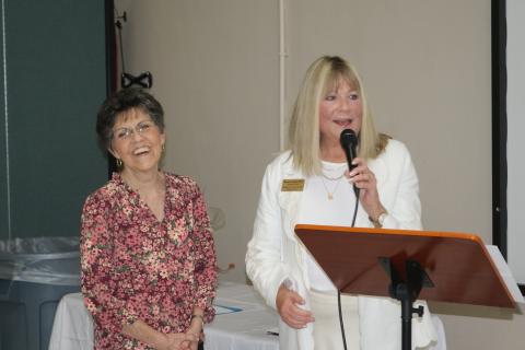 Sara Singleton (left) stands with Sharon Souder, Pregnancy Care Center executive director, after being named the Ministry of the Year award recipient Tuesday night at the organization’s annual volunteer banquet. (TONY BRITT/Lake City Reporter)