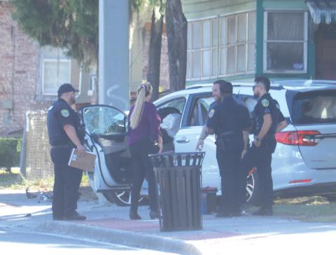 First responders investigate the scene of a crash on N. Marion Avenue Wednesday afternoon that led to the death of an 82-year-old woman. (TONY BRITT/Lake City Reporter)
