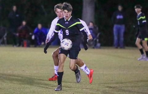 Columbia's Braxton Dicks chases down possession of the ball against Keystone Heights on Nov. 10. (BRENT KUYKENDALL/Lake City Reporter)