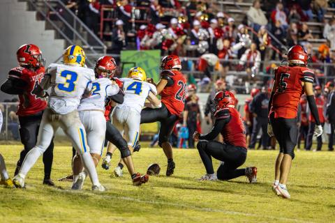 Chipley linebacker Tucker Locke blocks Lafayette kicker Alex Townsend’s extra point attempt that ended up being the difference in the game Friday. (JACK HOWDESHELL/Lake City Reporter)