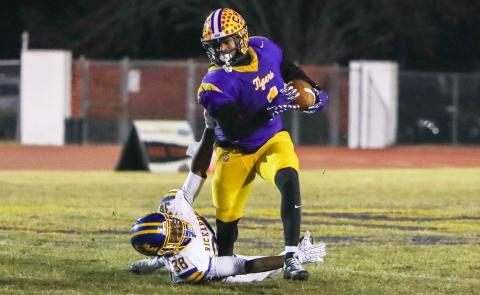 Columbia running back Kameron shakes off Rickards linebacker Marlon Wilson after stiff-arming him on his way to a 41-yard touchdown run during Friday’s Region 1-4A quarterfinal. (BRENT KUYKENDALL/Lake City Reporter)