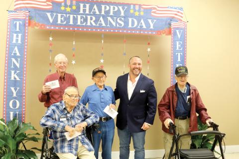 The oldest veterans to attend the annual veterans barbecue luncheon posed for a picture with State Rep. Danny Alvarez during the event. Pictured from left are: Leonard Kenneth Keen, 94, Army veteran; Donald Christensen, 95, Air Force veteran; Ray DeCant, 100, World War II veteran, State Rep. Danny Alvarez and Walt Lhamon, 93, Air Force veteran. (TONY BRITT/Lake City Reporter)
