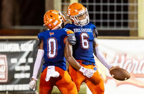 Branford running back TC Smith (6) celebrates with receiver Maurice Vought after scoring a touchdown against Hilliard on Sept. 26. (JACK HOWDESHELL/Lake City Reporter)