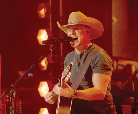 Lake City’s Adam Sanders performs during last week’s airing of ‘The Road’ on CBS. Sanders is one of three finalists in the reality series that concludes Sunday. (COURTESY)