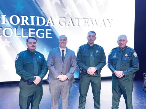 Cadets with the Columbia County Sheriff’s Office graduated Wednesday from the police academy at Florida Gateway College. Graduates were Jesse Braden (from left), Jarrod Spurlock and Anthony Cortese, Jr. Sheriff Wallace Kitchings is pictured with the graduates. (COURTESY)