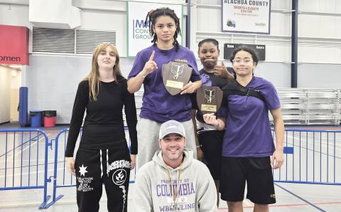 The Columbia girls wrestling team had four wrestlers place at the Bobcat Round Robin on Friday. (COURTESY)