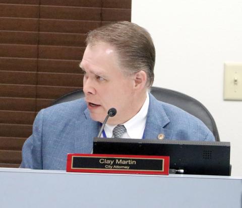 Lake City Attorney Clay Martin speaks during Monday’s City Council meeting. (MORGAN MCMULLEN/Lake City Reporter)