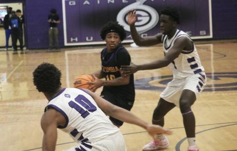 Columbia guard Zadrian Knowlton drives into the lane against Gainesville on Tuesday. (JORDAN KROEGER/Lake City Reporter)