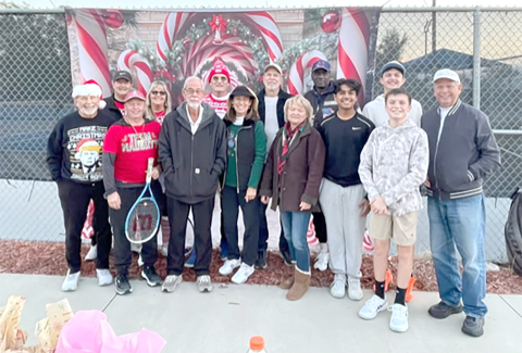 The Lake City Columbia County Tennis Association raised money and collected toys for the Christmas Dream Machine at a Mistletoe Tennis Social event Tuesday. (COURTESY)