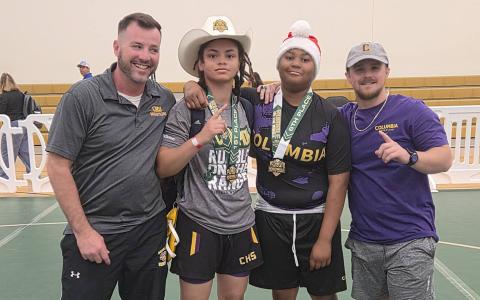 Columbia wrestler Bella Guerrier-Lajoir (left) won the 140 class title while Leah Brown (right) also medaled with a sixth-place finish in the 190 class at the Rumble on the Range at The Villages Charter on Friday. (COURTESY)