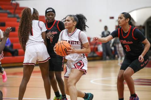 Fort White guard Mariah Cox tries to find a driving lane against Williston on Tuesday. (BRENT KUYKENDALL/Lake City Reporter)