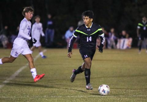 Columbia's David Gomez dribbles while looking for an open teammate against Keystone Heights on Nov. 10, 2025. (BRENT KUYKENDALL/Lake City Reporter)