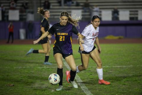 Columbia's Laelle Thompson gathers possession of the ball against Santa Fe on Tuesday. (BRENT KUYKENDALL/Lake City Reporter)