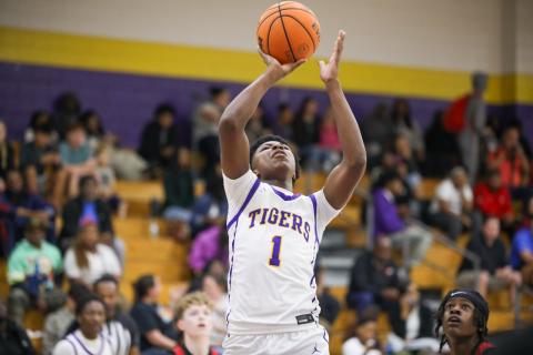 Columbia guard Shaheed White makes a layup against The Rock on Jan. 6. (BRENT KUYKENDALL/Lake City Reporter)