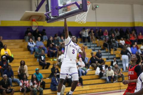 Columbia guard Zaeon Jones makes a layup against The Rock on Jan. 6. (BRENT KUYKENDALL/Lake City Reporter)
