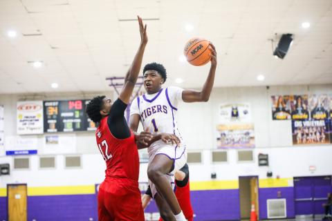 Columbia guard Shaheed White goes up for a layup against The Rock on Jan. 6. (BRENT KUYKENDALL/Lake City Reporter)