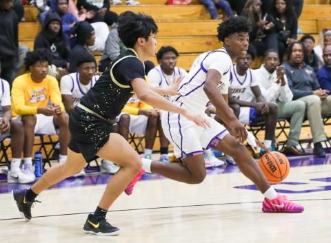 Columbia guard Murkail Cray drives to the basket against Buchholz on Jan. 13. (BRENT KUYKENDALL/Lake City Reporter)