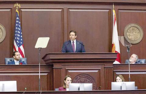 Florida Governor Ron DeSantis delivers his State of the State address as Florida House Speaker Daniel Perez (left) and Florida Senate President Ben Albritton (right) listen Tuesday. (MATIAS J. OCNER/Miami Herald/TNS)