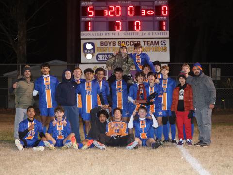 The Branford boys soccer team shows off the District 2-2A championship trophy after defeating Hamilton County 5-0 on Tuesday. (PAUL BUCHANAN/Lake City Reporter)