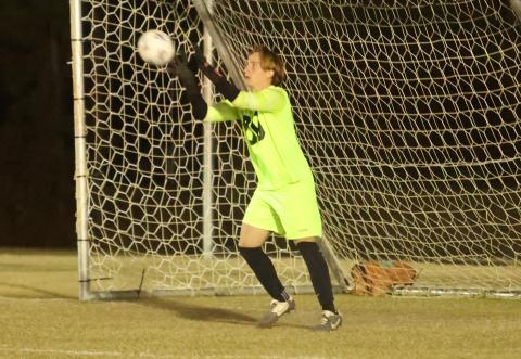 Columbia goalkeeper Logan Wheeldon makes a save against Suwannee on Dec. 1. (PAUL BUCHANAN/Lake City Reporter)