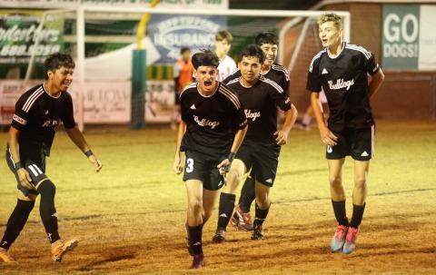 Suwannee's Rember Alonso (3) celebrates with teammates after scoring a goal against Williston on Nov. 21, 2025. (PAUL BUCHANAN/Lake City Reporter)