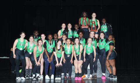 The Suwannee girls weightlifting team poses with the District 4-1A medals and trophies on Friday. (PAUL BUCHANAN/Lake City Reporter)