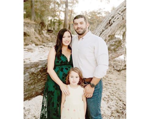 Dwayne Law, a Central Florida Electric Cooperative lineman, is left raising his daughter, Lolliegh, and newborn son, Landry, after his wife, Kaitlynn, passed away during childbirth in December. A benefit luncheon is set for Feb. 19 to help the family. (COURTESY)
